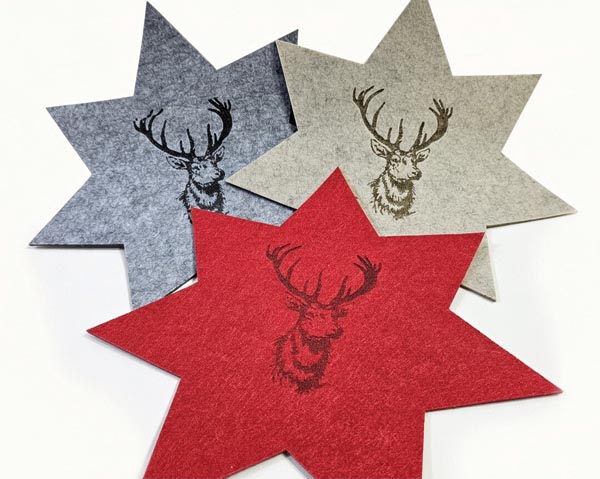 Star-shaped placemat XL 33x32cm, decorated with a large, tre