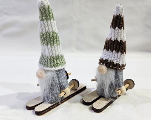 Golden gnome on a wooden pedestal 11.5x8x5cm, with wooden st