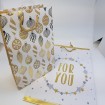 Very elegant gift bag 23x18cm with bright gold embossing and